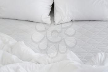 Modern orthopedic mattress with bedding�