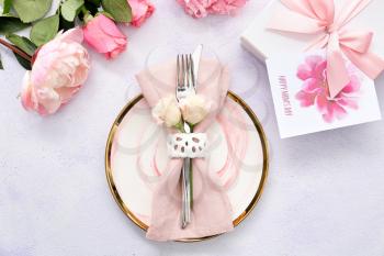 Beautiful table setting for Mother's Day on light background�