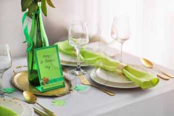 Beautiful table setting for St. Patrick's Day celebration�