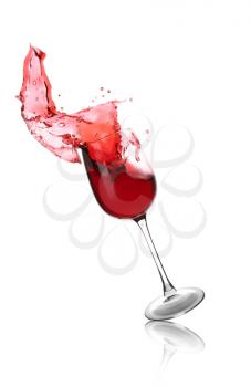 Falling glass with red splashing wine on white background�