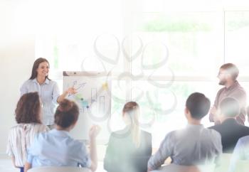 Young people having business meeting in office, view through glass�