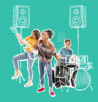 Teenage musicians with drawing instruments playing against color background�