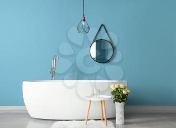 Interior of modern bathroom with blue wall�