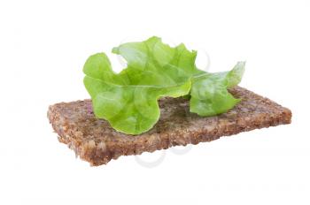 whole grain rye bread sandwich with lettuce isolated on white