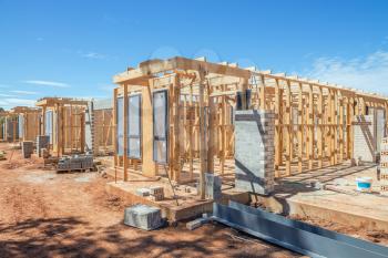 new suburban homes currently under construction in row 