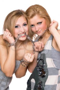 Royalty Free Photo of Two Girls in Chains