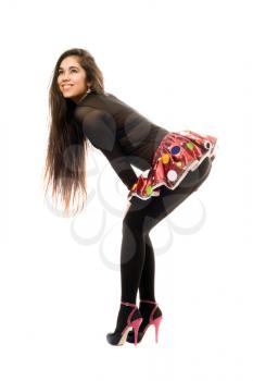 Royalty Free Photo of a Young Woman Bending Over in a Short Skirt