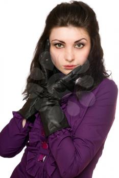 Royalty Free Photo of a Young Woman in a Purple Coat