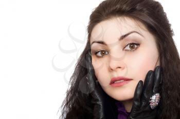Royalty Free Photo of a Woman With a Gloved Hand at Her Face