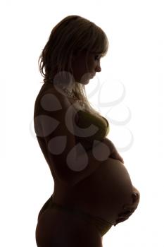 Royalty Free Photo of a Pregnant Woman in Silhouette