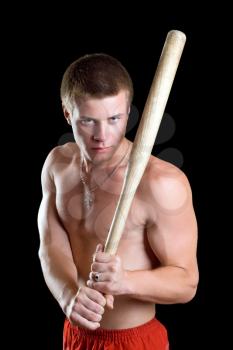Royalty Free Photo of a Shirtless Man With a Bat