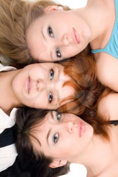 Royalty Free Photo of Three Women With Their Heads Touching
