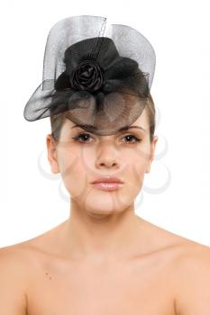 Royalty Free Photo of a Woman With a Bow on Her Head