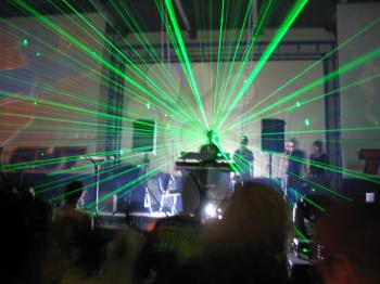 Royalty Free Photo of a DJ and Green Laser