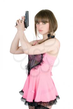 Royalty Free Photo of a Girl in Pink Holding a Gun