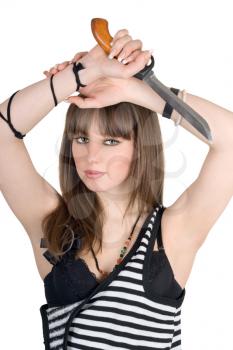 Royalty Free Photo of a Girl in a Striped Dress Holding a Knife