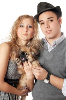 Royalty Free Photo of a Couple With a Dog