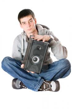 Royalty Free Photo of a Boy Holding a Speaker