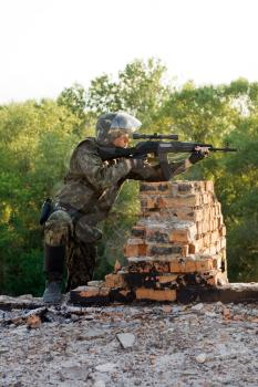 Royalty Free Photo of a Sniper With a Machine Gun