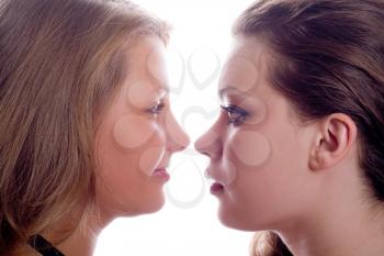 Royalty Free Photo of Young Girls Face to Face