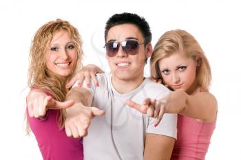 Royalty Free Photo of a Boy and Two Girls Pointing