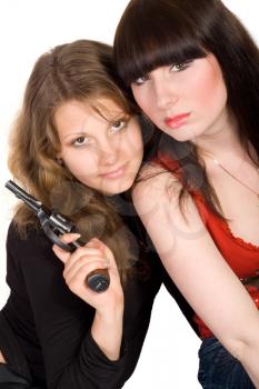 Royalty Free Photo of Two Women With a Pistol