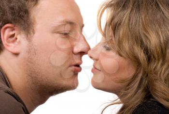 Royalty Free Photo of a Couple About to Kiss