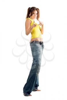Royalty Free Photo of a Young Woman in Sloppy Jeans
