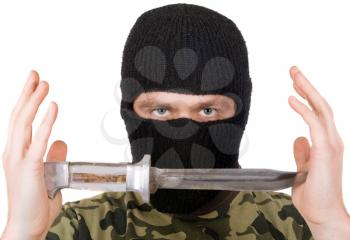 Royalty Free Photo of a Man Wearing a Mask and Holding a Big Knife