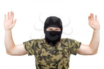Royalty Free Photo of a Man in a Balaclava With His Hands Up