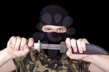 Royalty Free Photo of a Man With a Knife Wearing a Balaclava