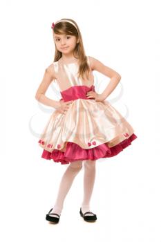 Playful little lady in a dress. Isolated