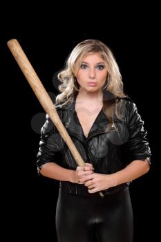 Upset girl with a bat in their hands. Isolated