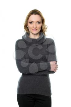 Portrait of a young woman in sweater. Isolated