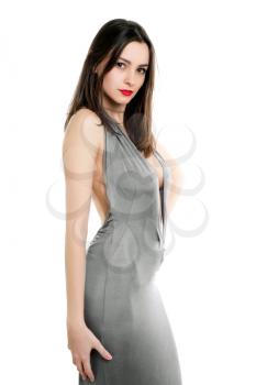 Sexy young woman wearing elegant grey dress. Isolated on white
