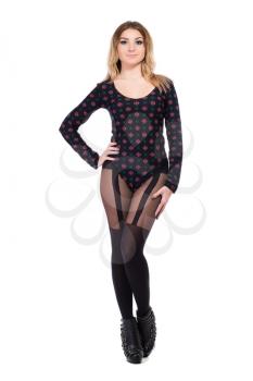Pretty blond woman posing in black tights. Isolated on white