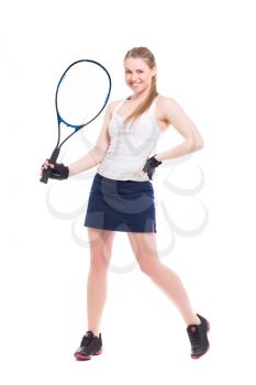 Young smiling woman posing with tennis racket. Isolated on white