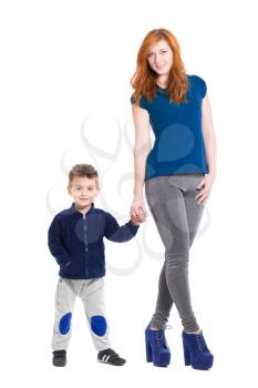 Young cheerful woman with a little boy. Isolated on white