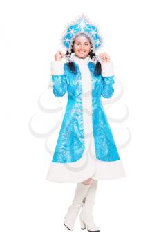 Pretty playful woman wearing winter costume. Isolated on white