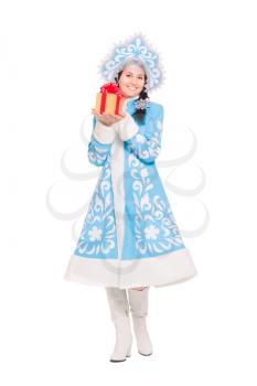 Cheerful brunette posing in a snow maiden costume with gift. Isolated on white