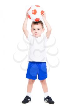 Nice little boy posing with a soccer ball. Isolated on white