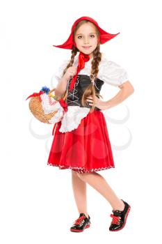 Smiling girl posing in a dress of little red riding hood. Isolated on white