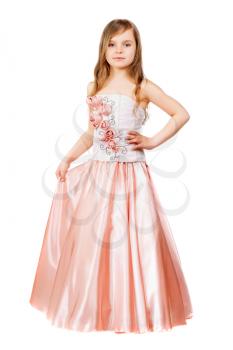 Little nice girl posing in chic peach dress. Isolated on white