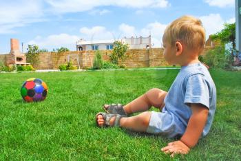 Royalty Free Photo of a Little Boy Playing