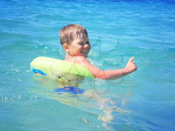 Royalty Free Photo of a Little Boy Swimming