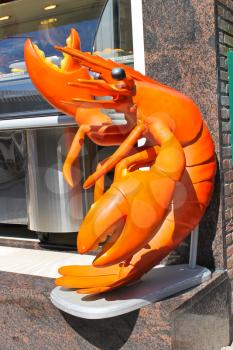 A stuffed lobster near a fish shop in Volendam. Netherlands