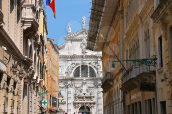 VENICE, ITALY - MAY 06, 2014: Street in front of the church of San Moise in Venice, Italy