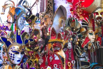 VENICE, ITALY - MAY 06, 2014: Souvenirs and carnival masks on street trading in Venice, Italy