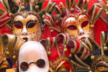 VENICE, ITALY - MAY 06, 2014: Souvenirs and carnival masks on street trading in Venice, Italy