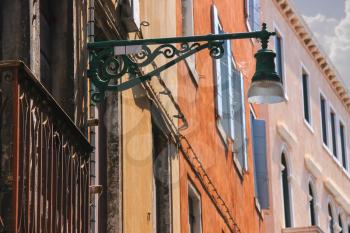 Lantern on the facade of old italian house. Venice 